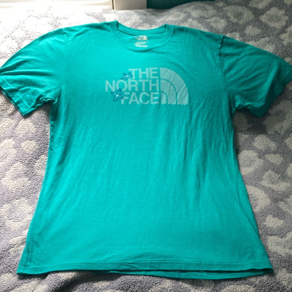 The North Face | teal short sleeve t-shirt with flower graphics